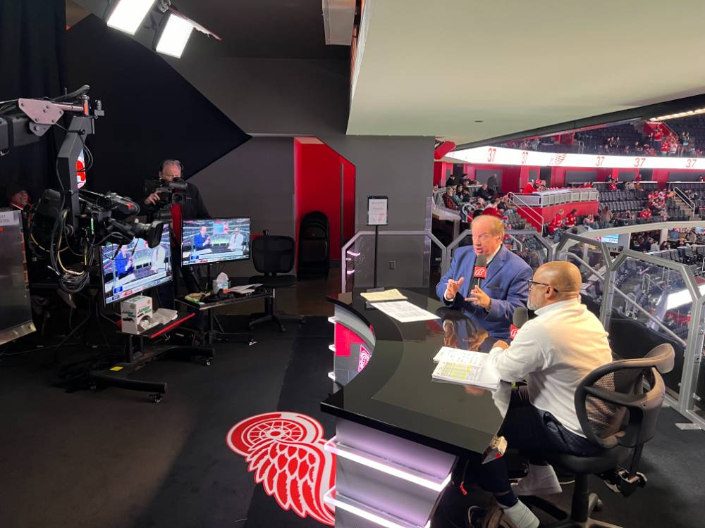 Commentators at Little Caesar's Arena.